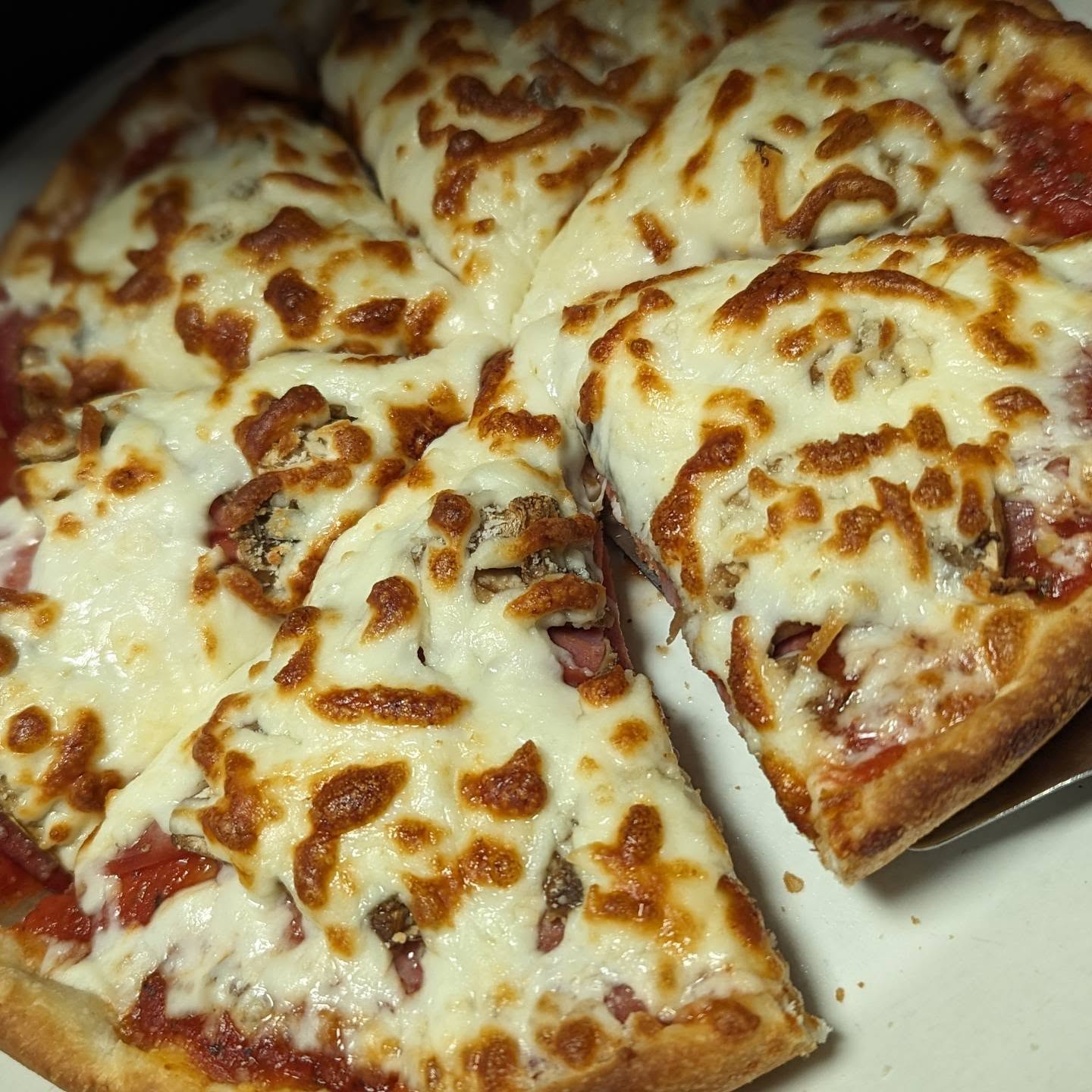 Hawaiian Pizza with pineapple and ham at Time Out Pub Edmonton